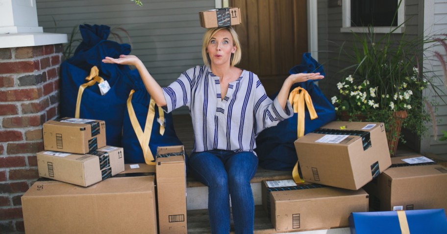 collin with Amazon Prime boxes