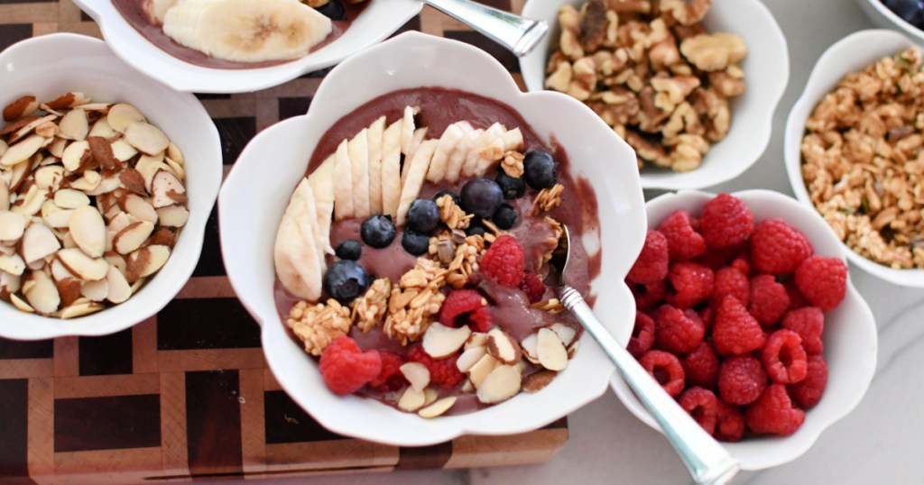 bowl with blended acai bowls and toppings