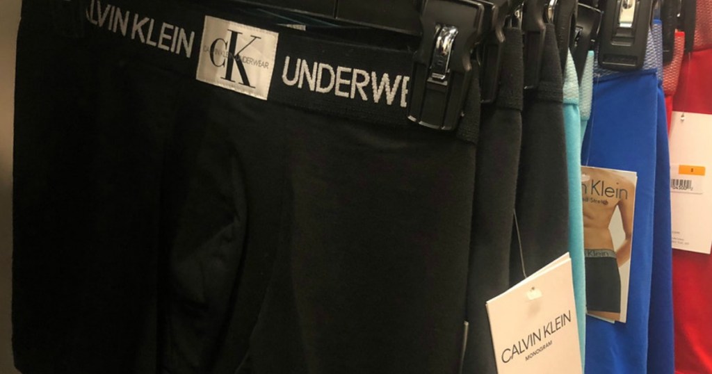 row of calvin klein underwear hanging in a store