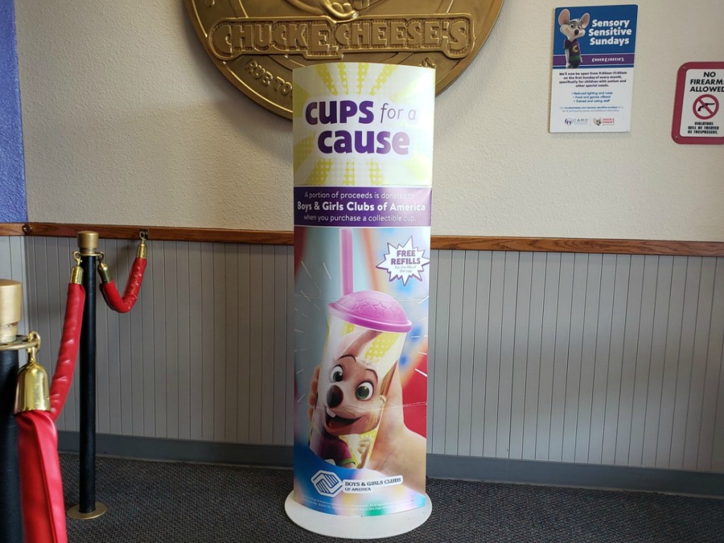 cups for a cause standing sign at chuck e cheese