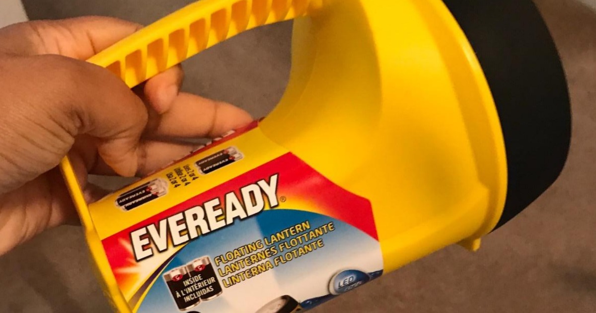 hand holding eveready flashlight