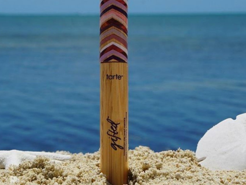 tube of mascara on the beach