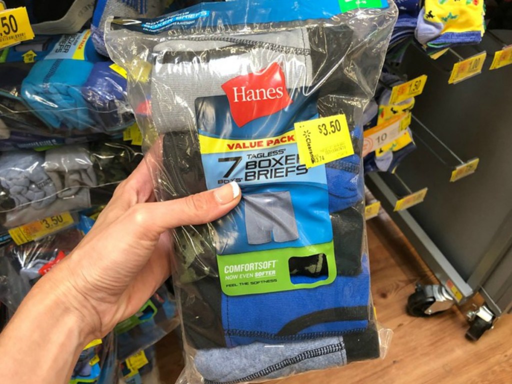 hand holding hanes package of underwear