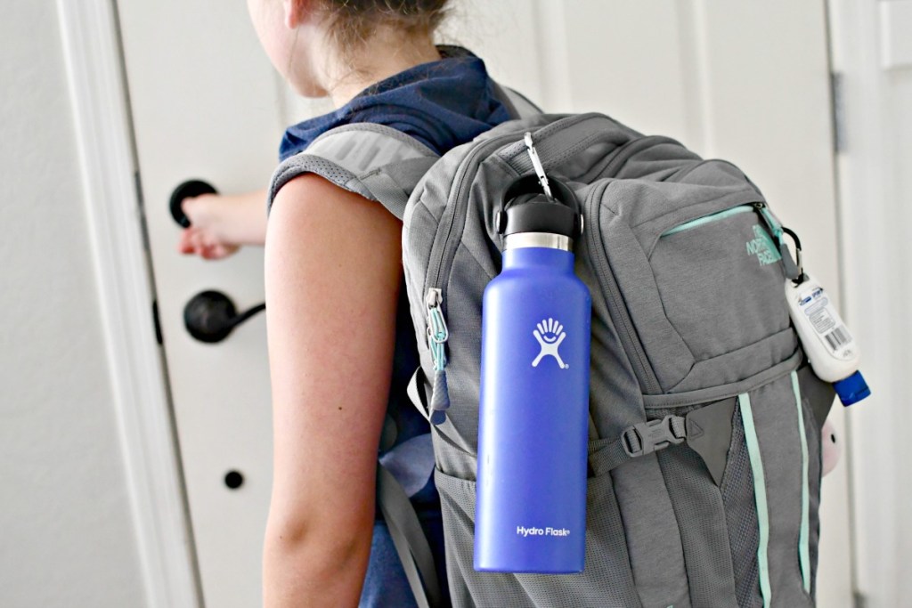 water bottle hanging off backpack 