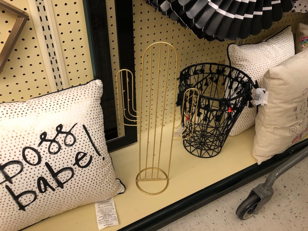 boss babe pillow, gold cactus, and basket