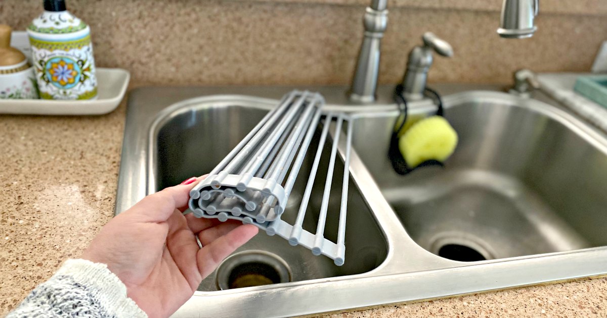 holding a roll-up drying mat