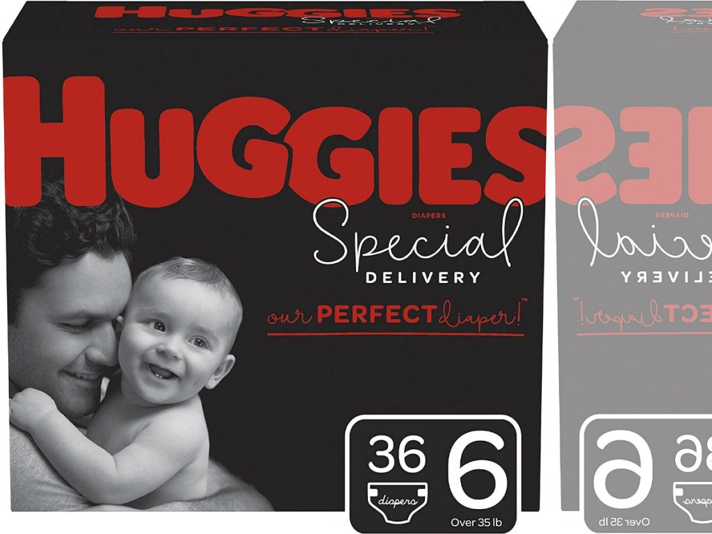 box of diapers with adult and baby on it