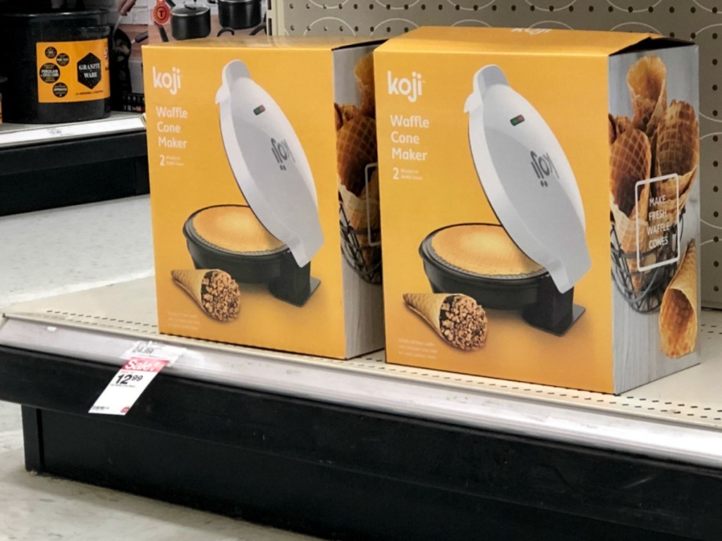 store shelf with 2 boxes of waffle makers on it