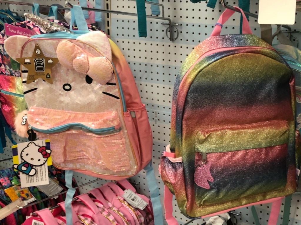 backpacks hanging on store display