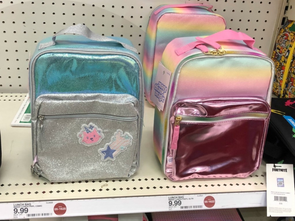 pink and blue lunch bags on store shelf
