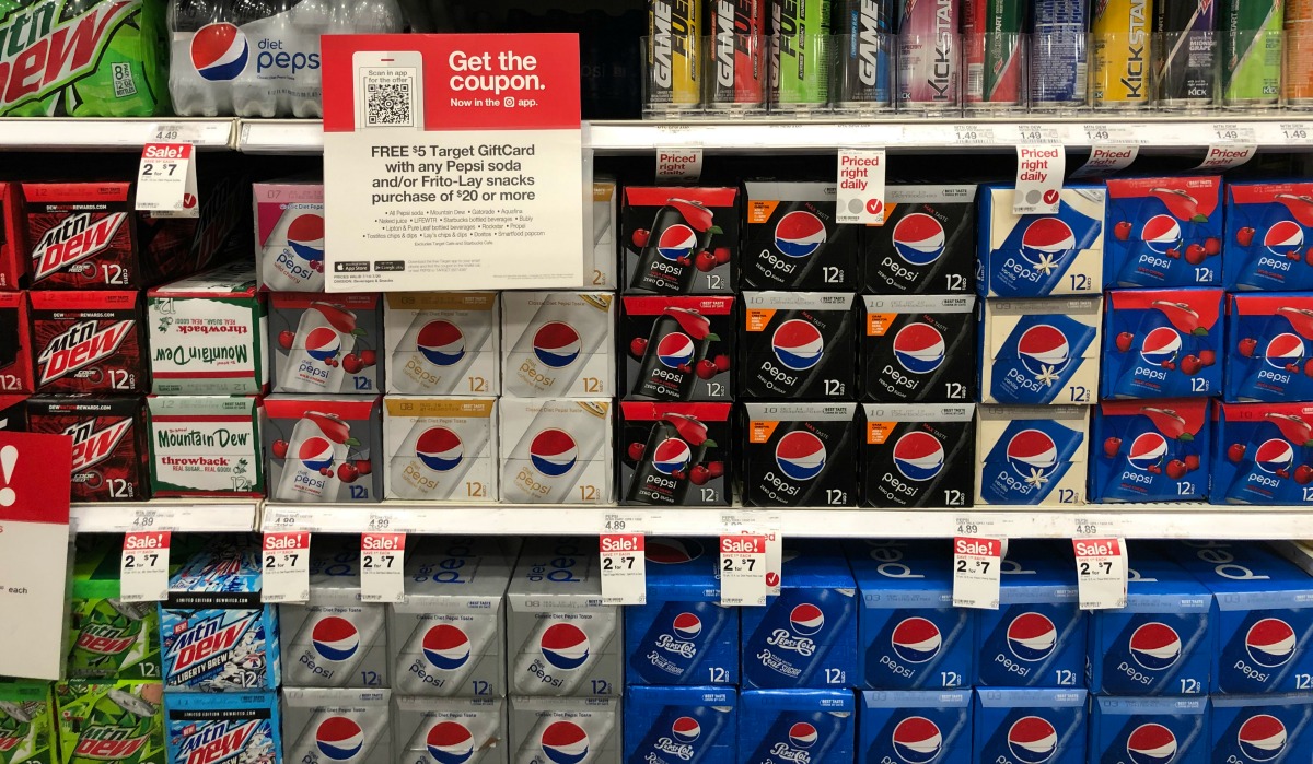 pepsi product 12-packs on a target store shelf with sale signs