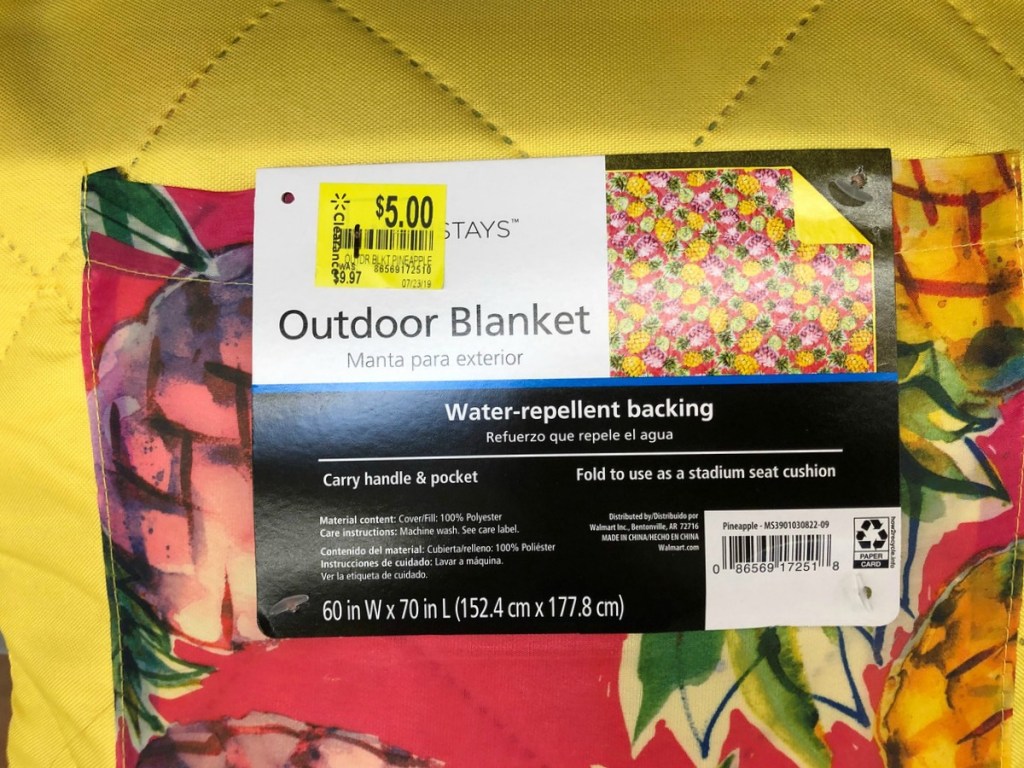 yellow blanket with clearance tag on it