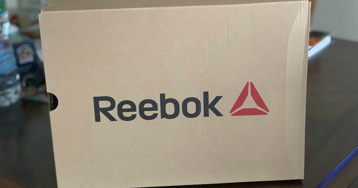 Reebok shoe box on dark counter top