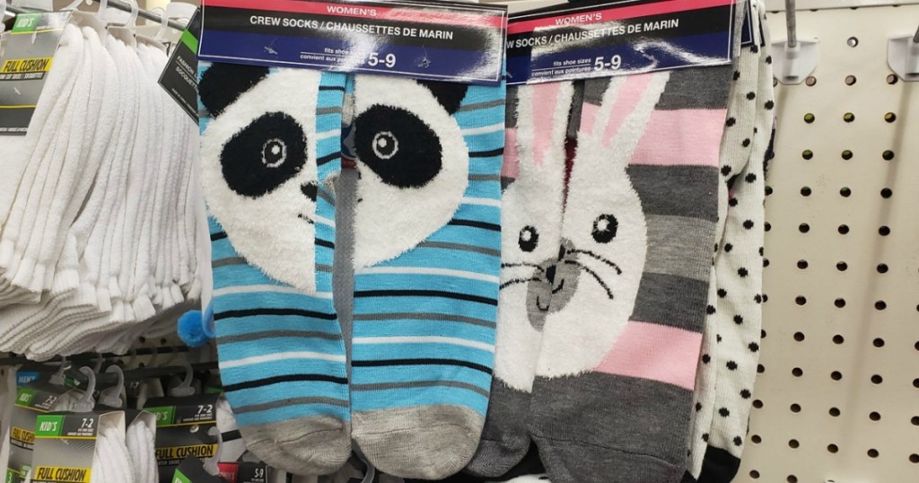socks hanging in store with animal faces