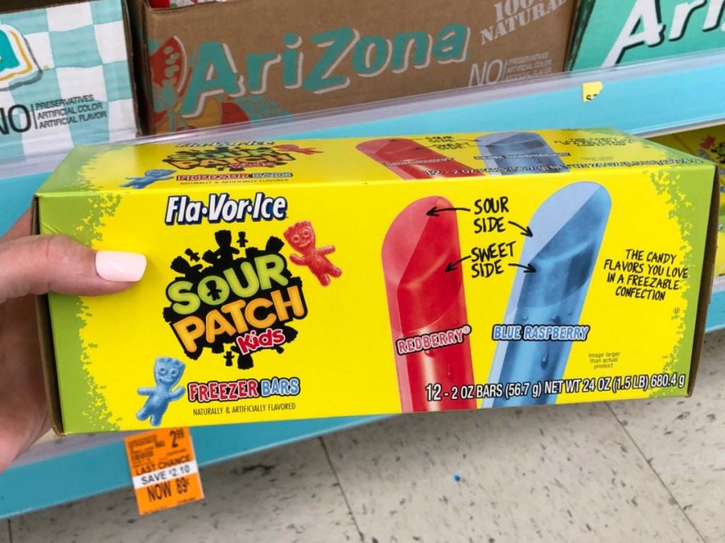 hand holding box of freezer pops in store
