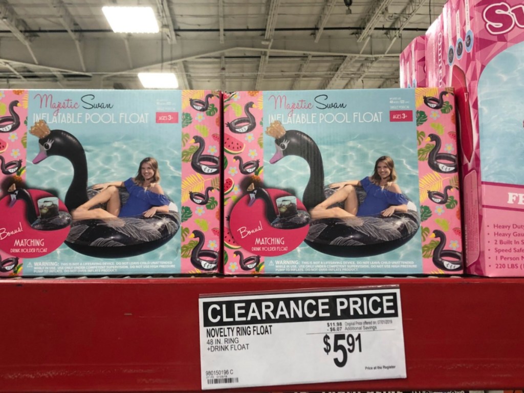 floaties for a pool in boxes on store shelf