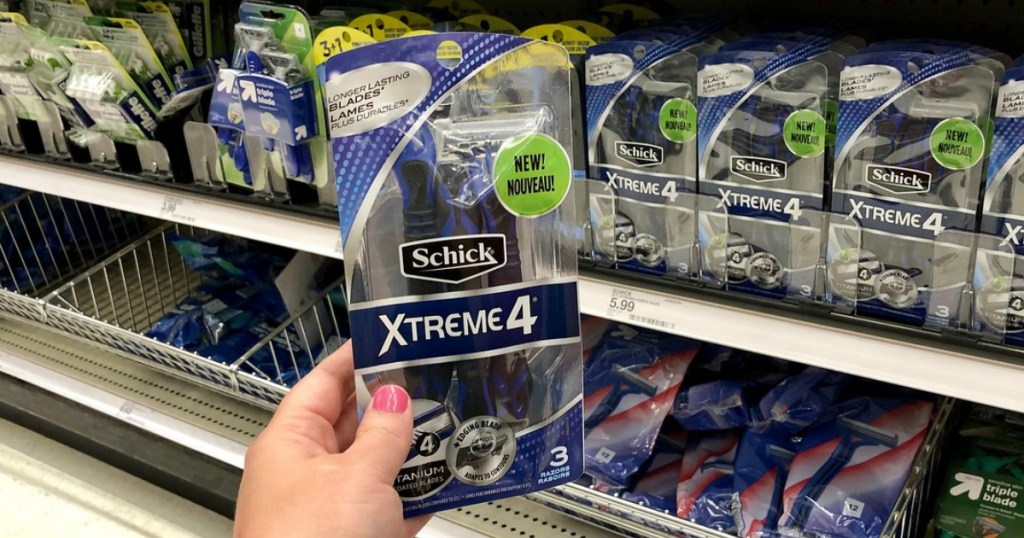 hand holding schick disposable razors at target