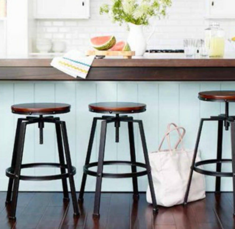 stools up against a bar in a house