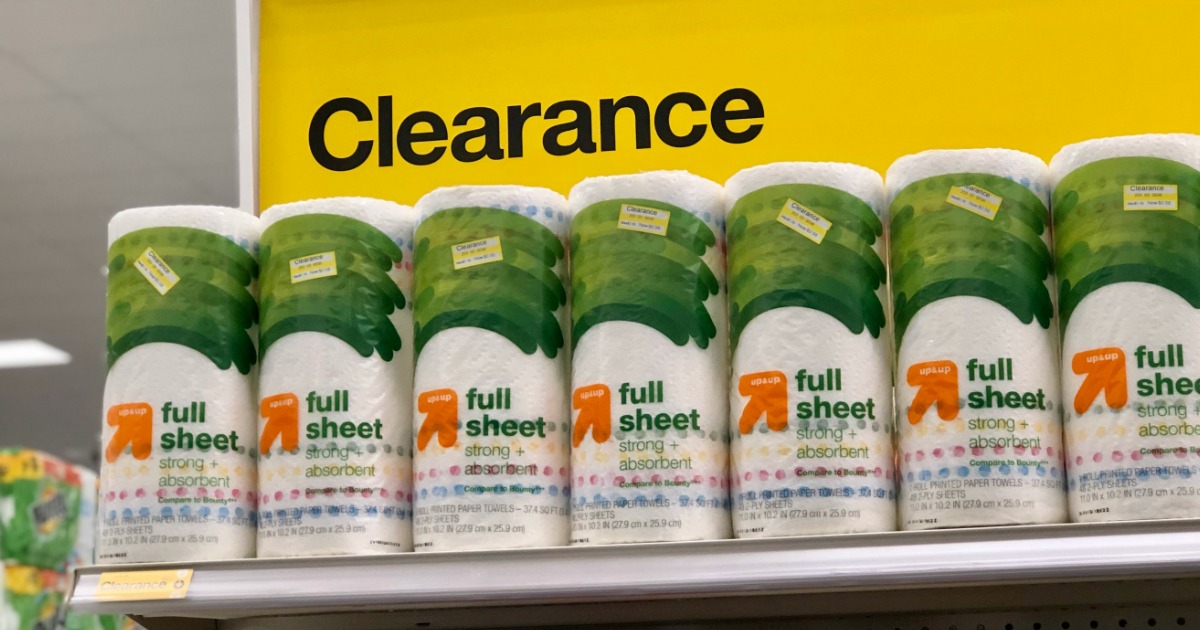row of up and up brand paper towels on a target clearance shelf