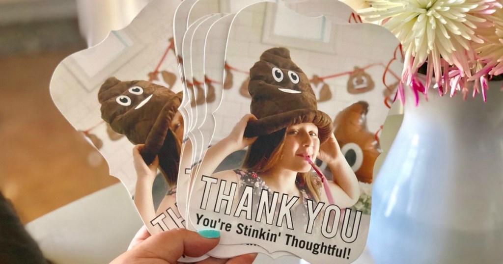 tiny prints thank you card with young girl wearing poop emoji hat