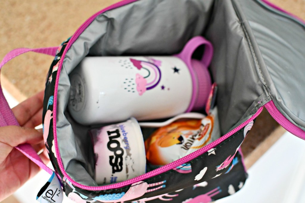 water bottle and snack inside lunch box 