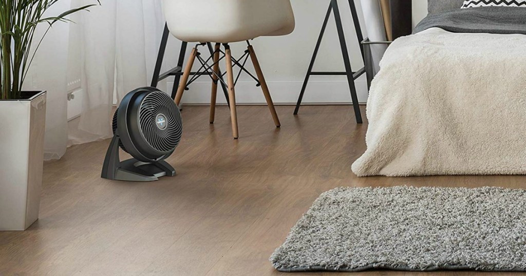 vornado fan on wooden floor of bedroom