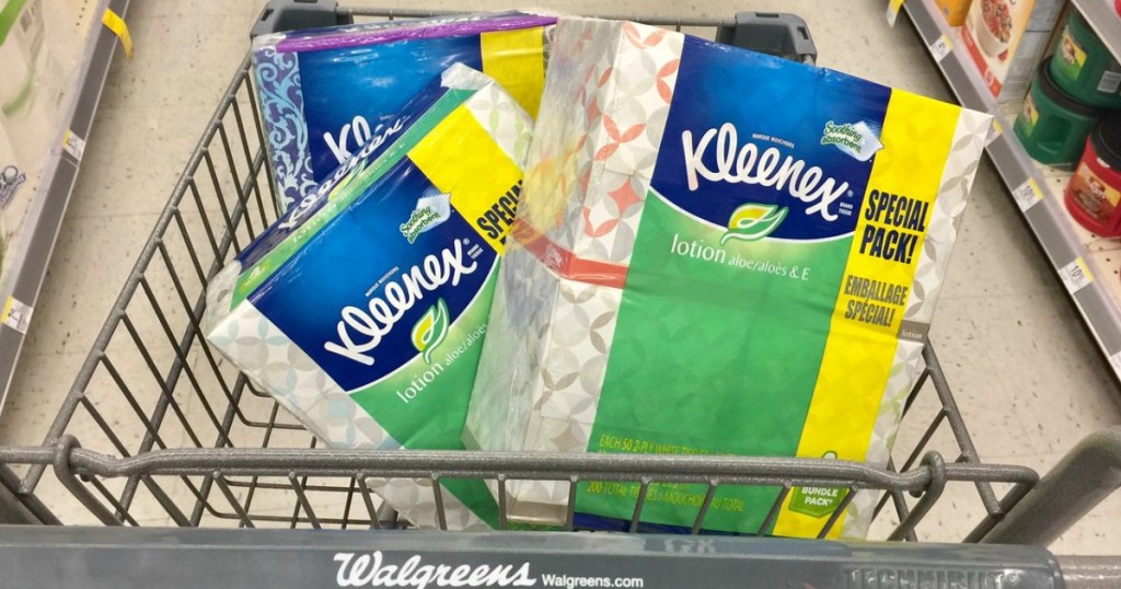 kleenex facial tissue multipacks in a shopping cart at walgreens
