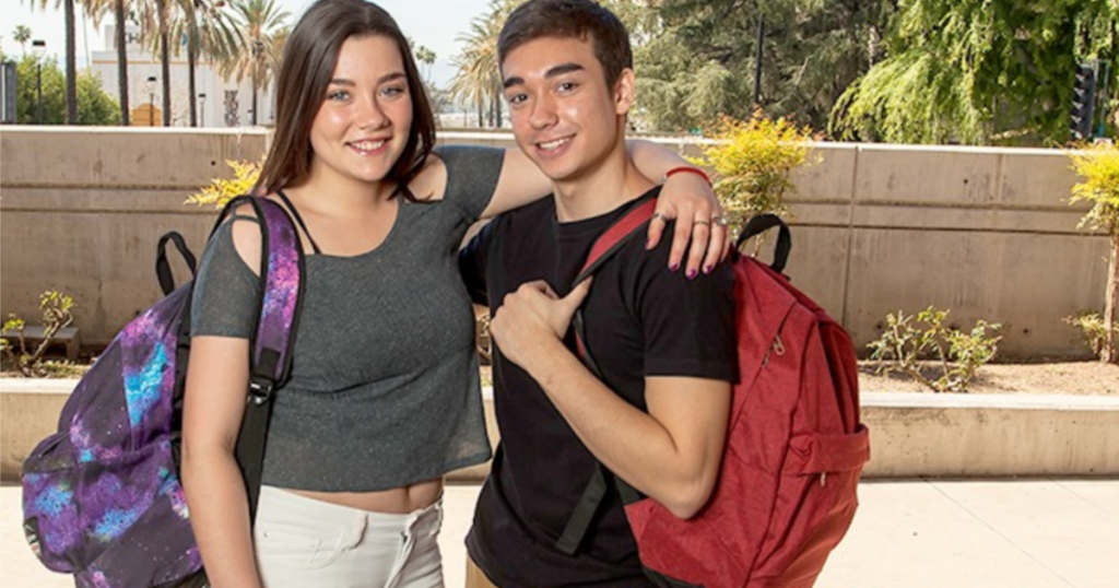 Alpine Swiss Backpacks with students holding them on their backs