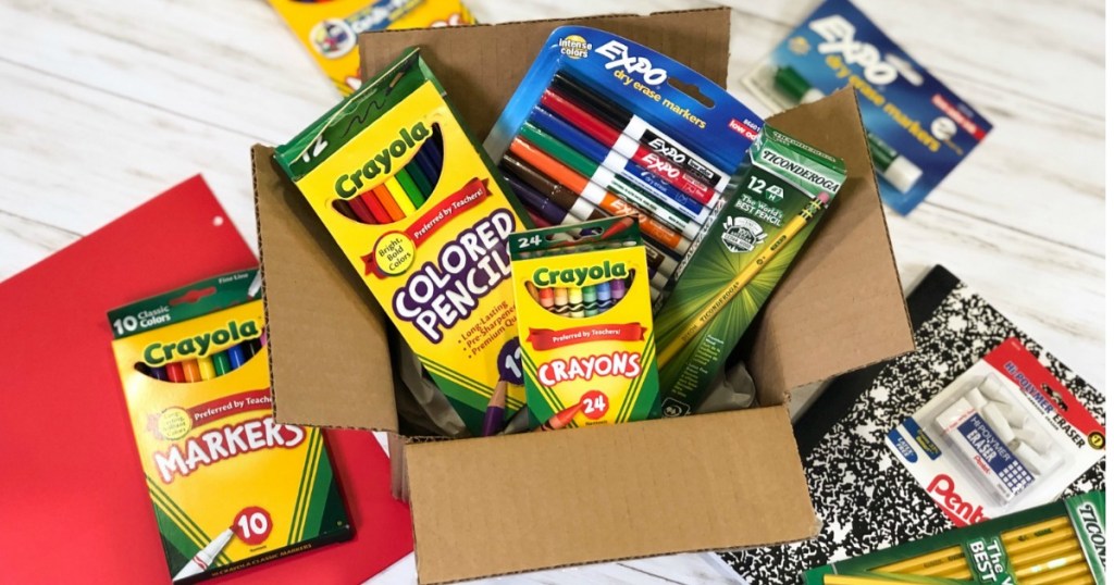 school supplies in cardboard box