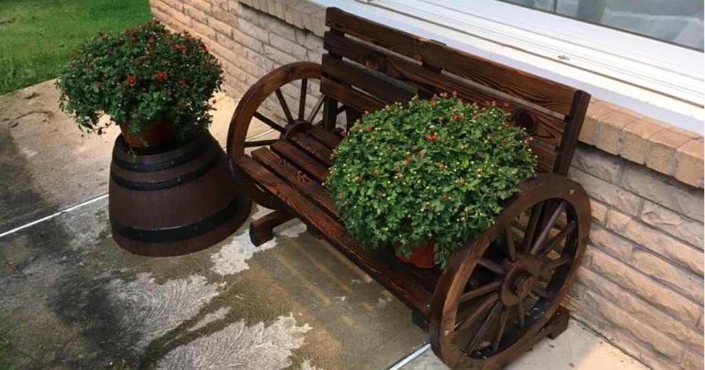wagon wheel bench with plants