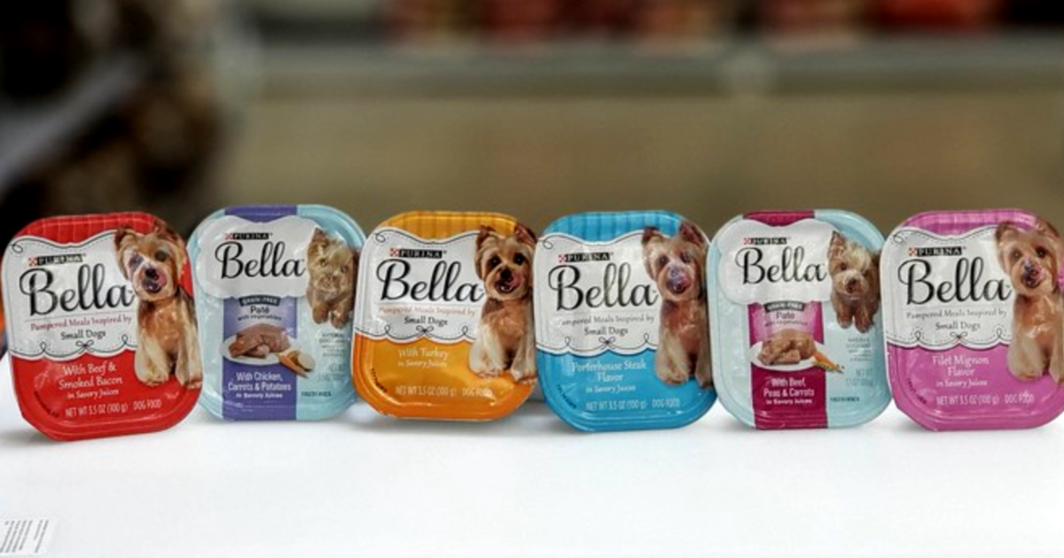 row of Bella wet dog food on a counter
