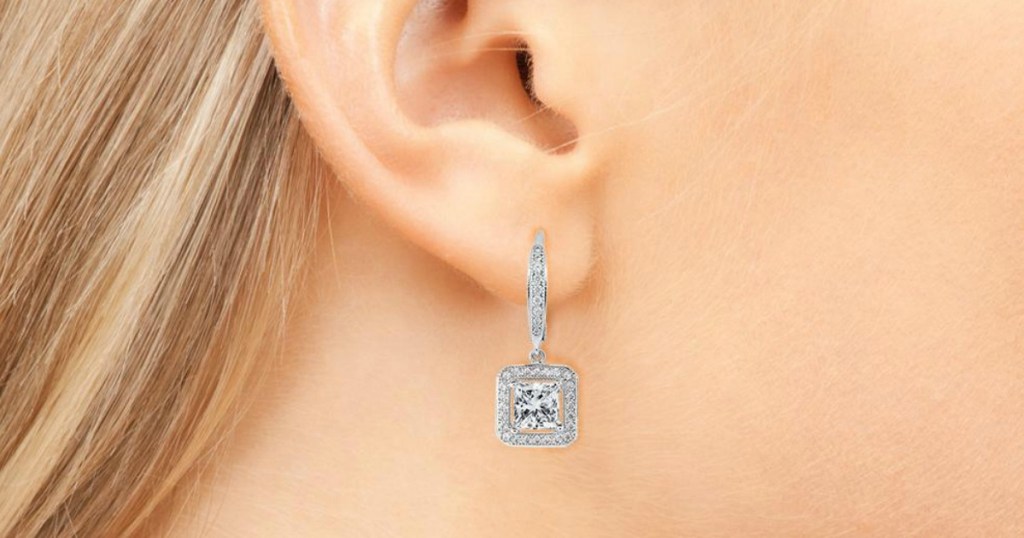 womans ear with fancy earring