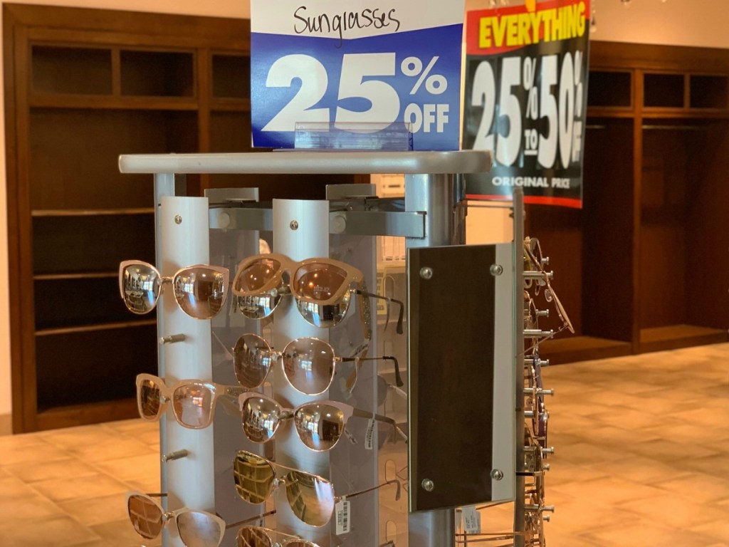 Charming Charlie Sunglasses on store rack