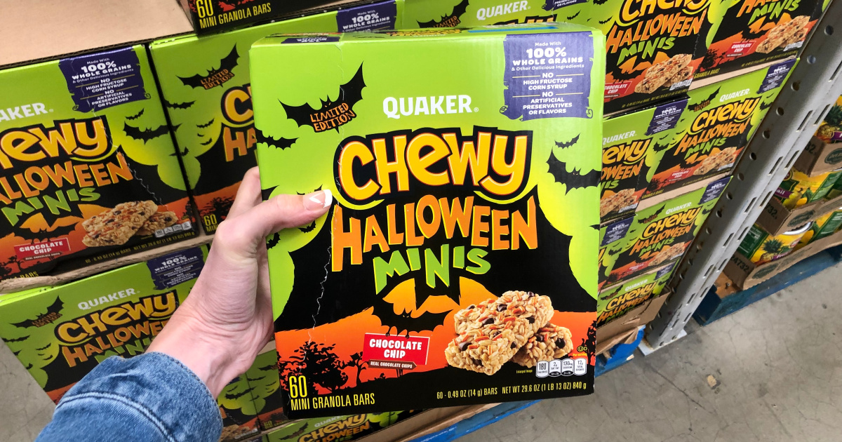 woman holding box of quaker chewy halloween minis