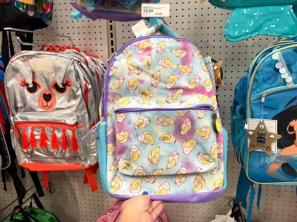 hand holding crunchy backpack
