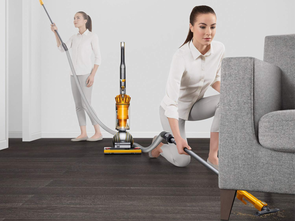 Dyson Ball Multi Floor 2 Upright Vacuum woman demonstrating usese