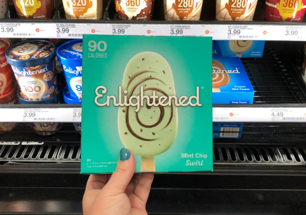 Hand holding Enlightened Ice Cream Bars at Target