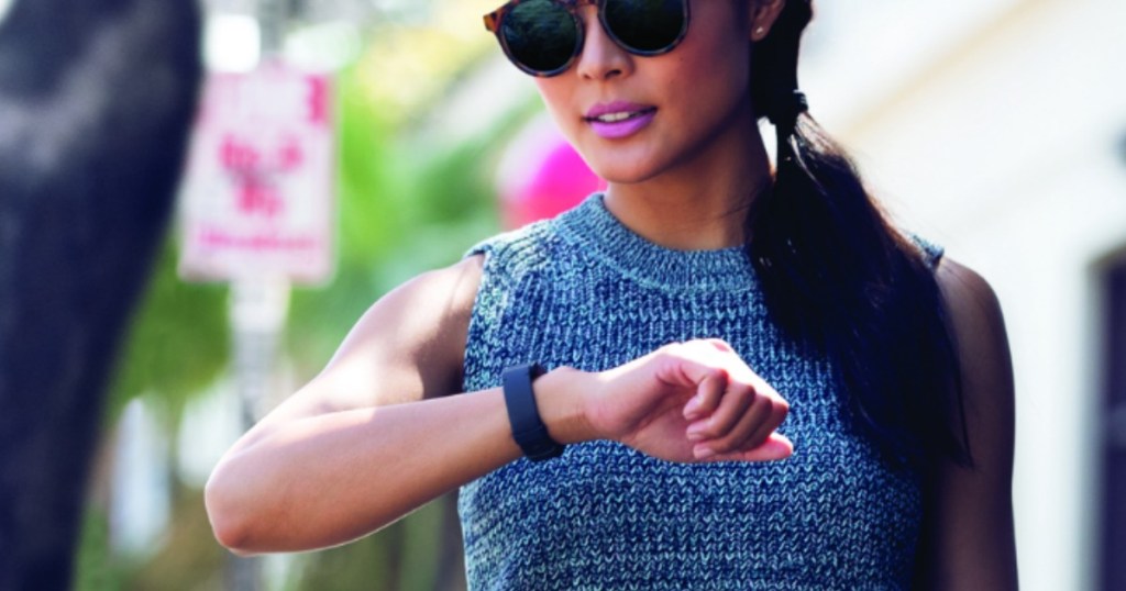 Woman wearing Fitbit activity tracker