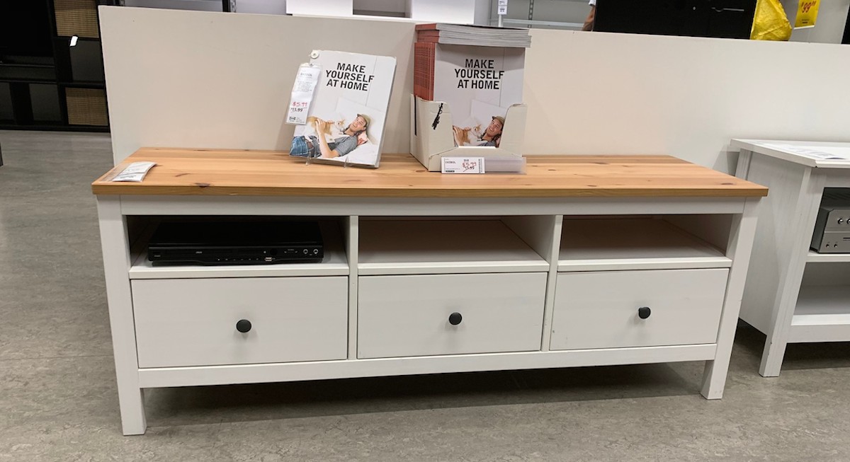 white tv stand with wood top at IKEA store