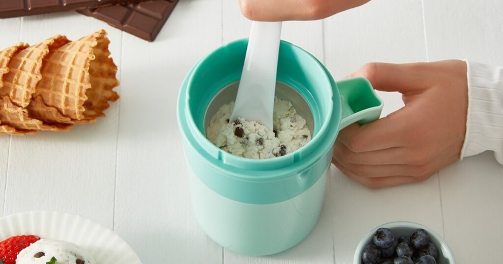 woman making ice cream with ice cream maker