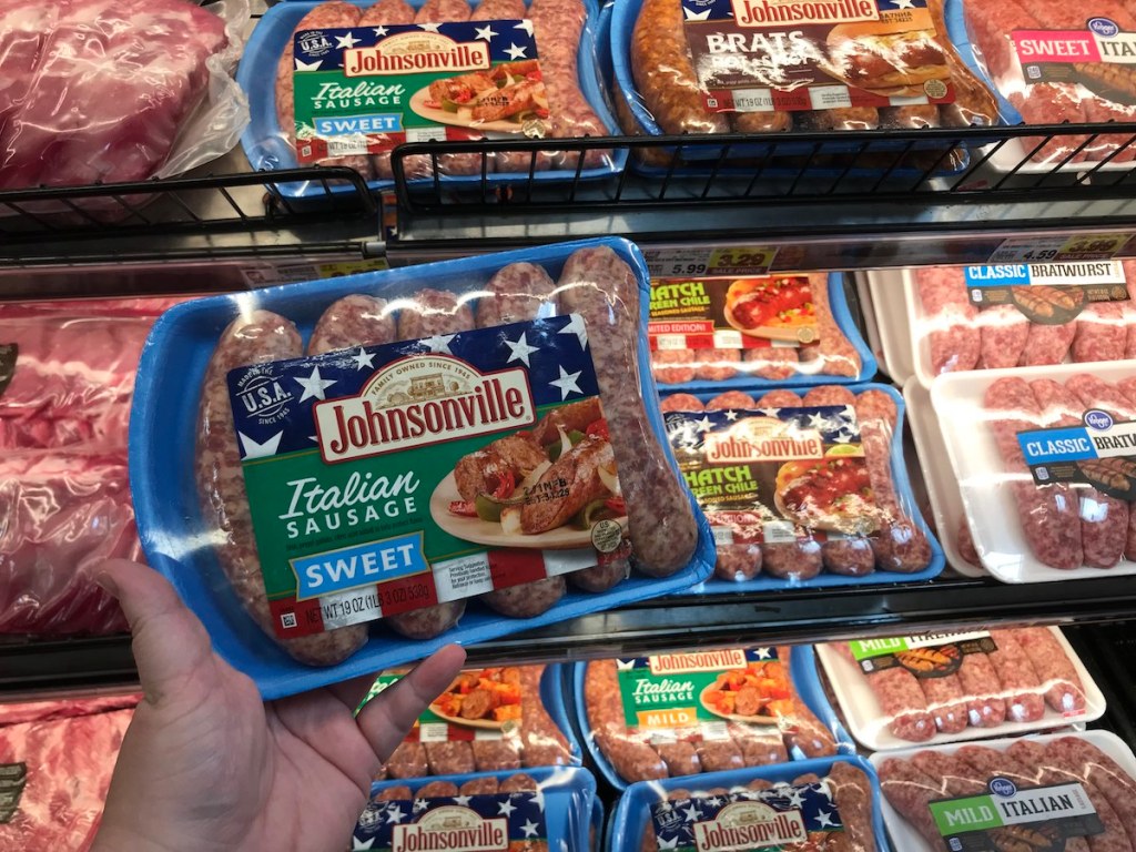 hands holding Johnsonville sausage