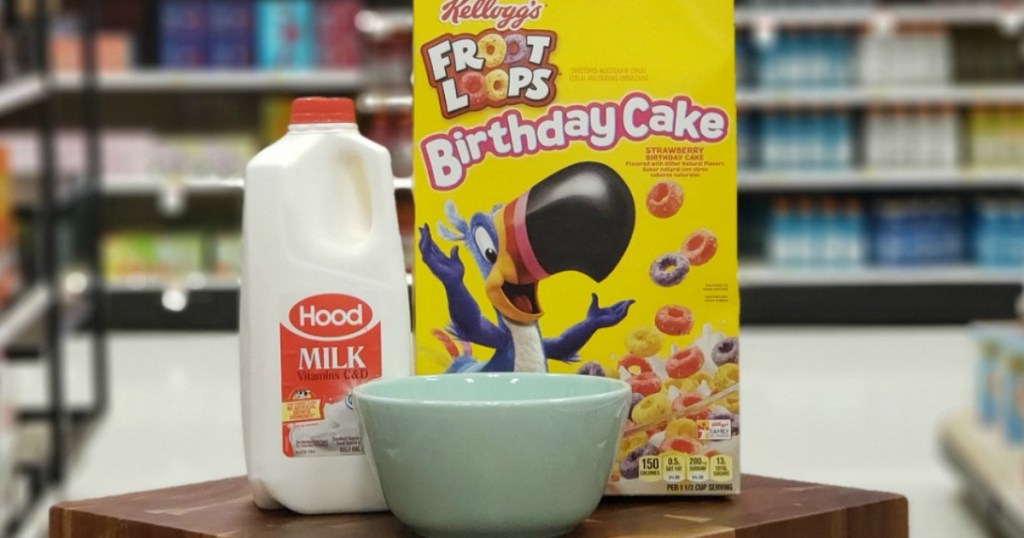Kellogg's brand Froot Loops breakfast cereal in new Birthday Cake flavor with half gallon of milk and cereal bowl