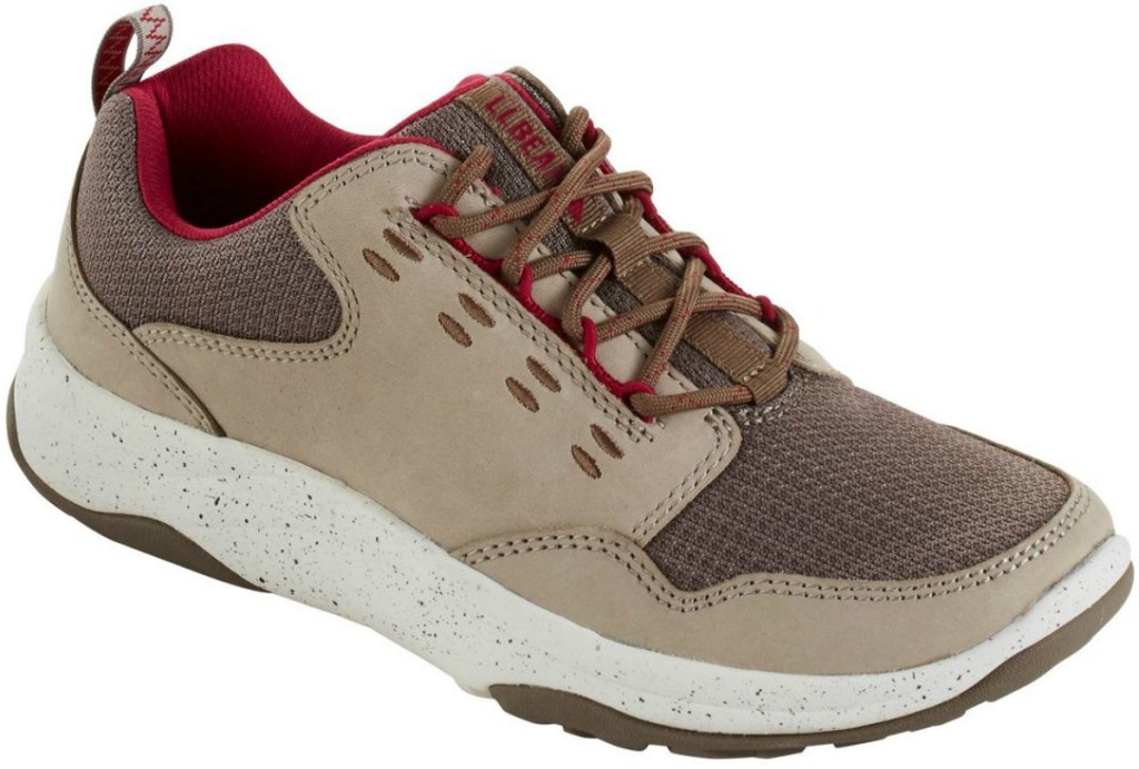 Women's trail sneaker in brown and tan with red accents