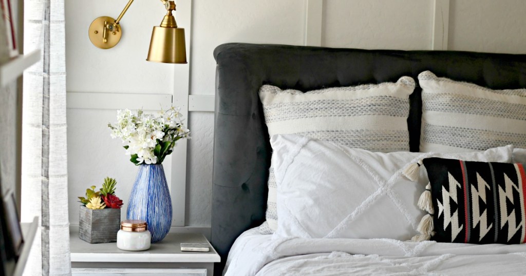 bedroom with nightstand and pillows on bed