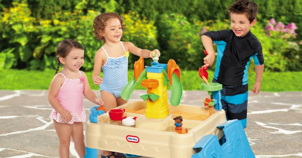 Little Tikes brand sand and water park play set with four kids playing