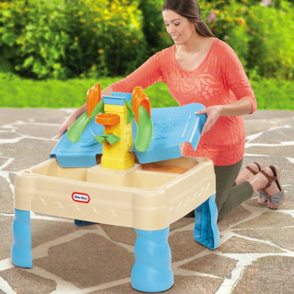 Little Tikes brand sand and water playset with mom setting it up