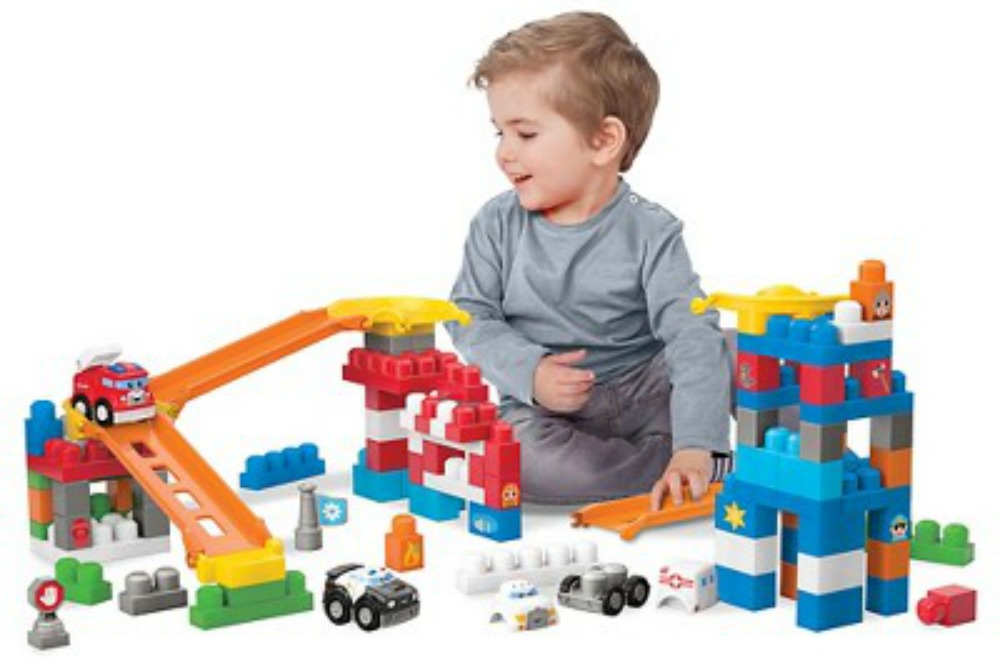 child playing with Mega Bloks toys
