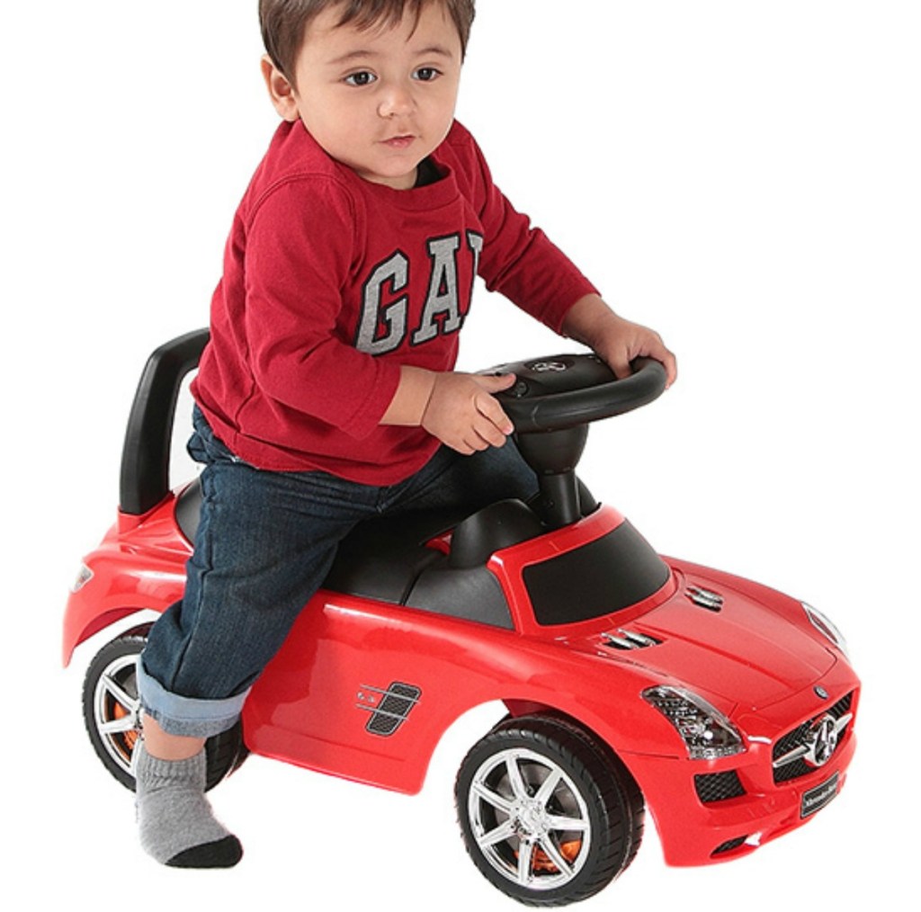 boy riding red Mercedes Ride-On Car