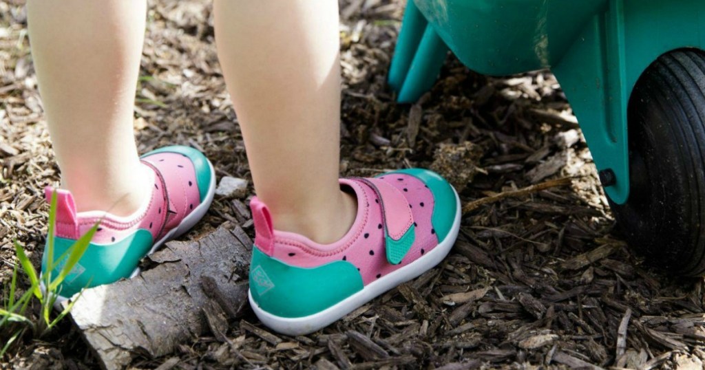 girl wearing watermelon sneakers