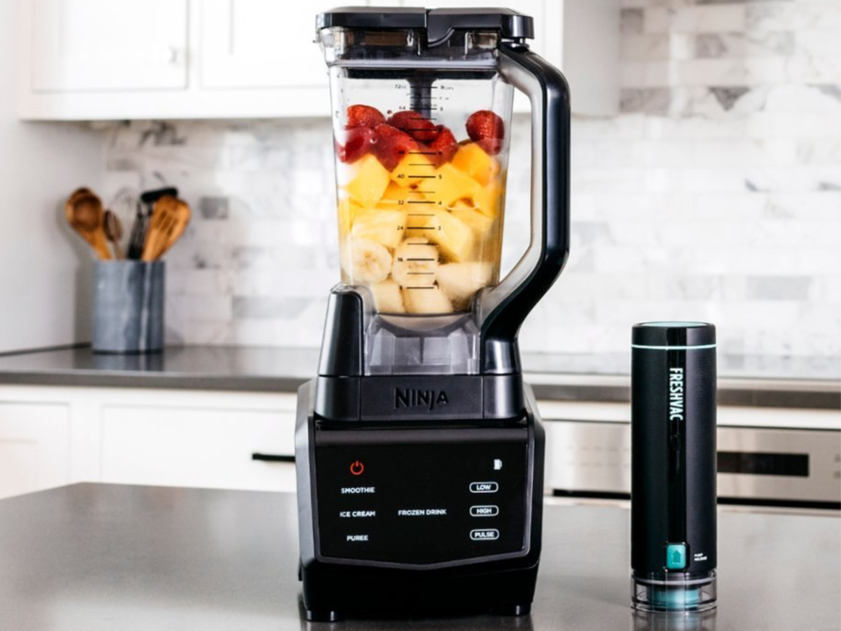 Ninja Smart Screen Blender DUO with FreshVac on kitchen counter with fruit